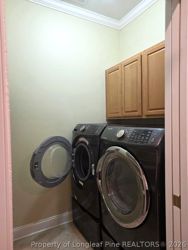 2671 Lockwood Road, Unit 202 Fayetteville, NC 28303 - Photo 8 of 32 a utility room with dryer and washer