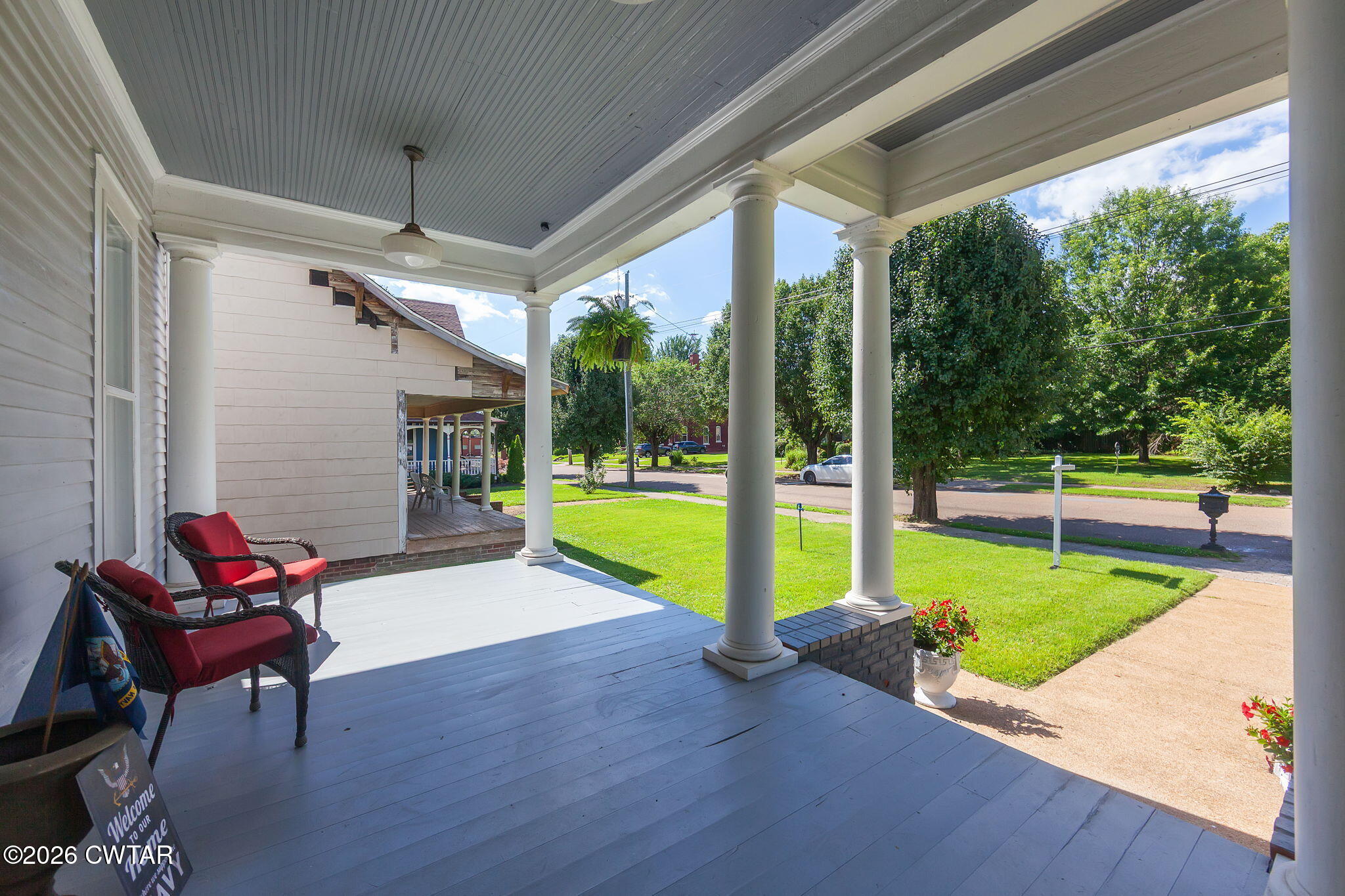 554 East Main Street Jackson, TN 38301 - Photo 46 of 60 a view of a patio with a table chairs and a patio