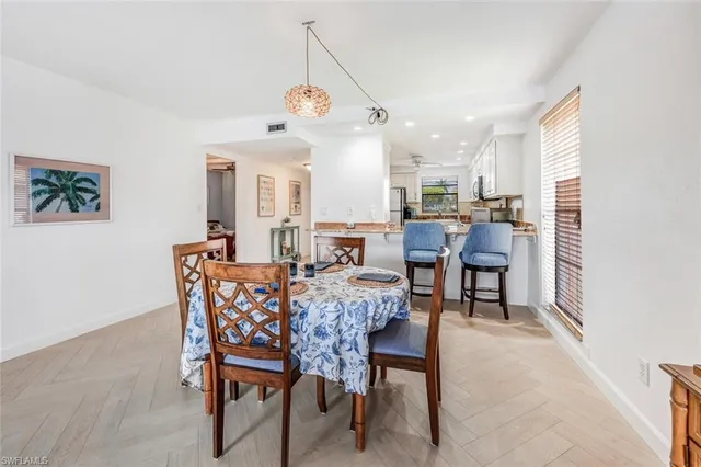 a view of a dining room with furniture