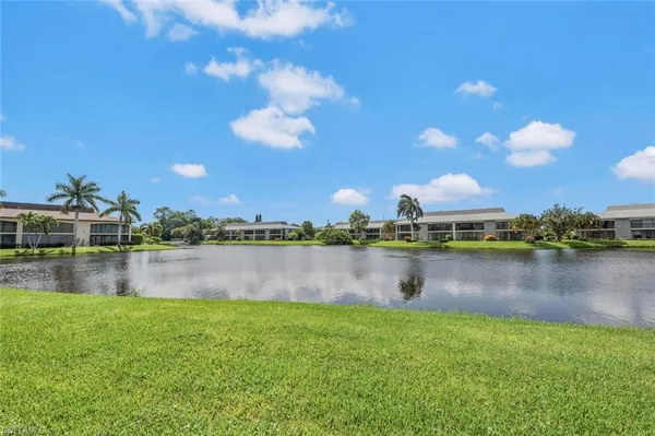 a view of a lake with a house