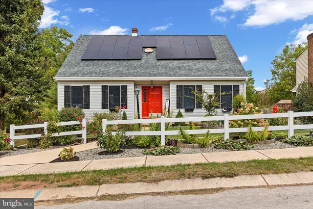 a front view of house with garage