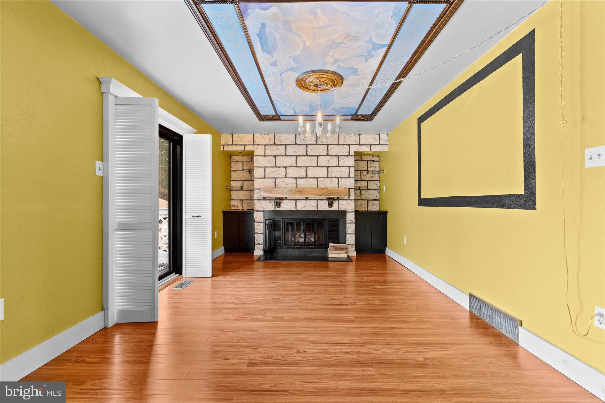 1769 Rainbow Circle York, PA 17408 - Photo 13 of 38 a view of an empty room with a window and wooden floor
