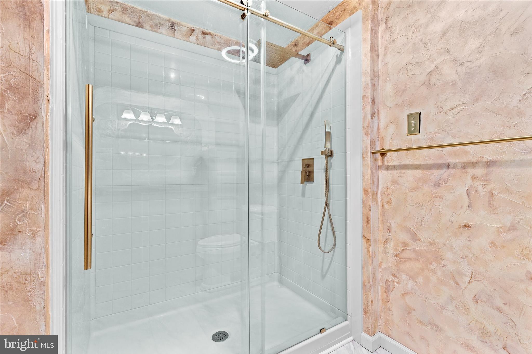 1769 Rainbow Circle York, PA 17408 - Photo 23 of 38 a bathroom with a glass shower door
