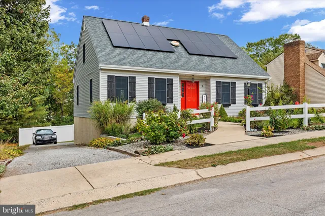 a front view of a house with a porch