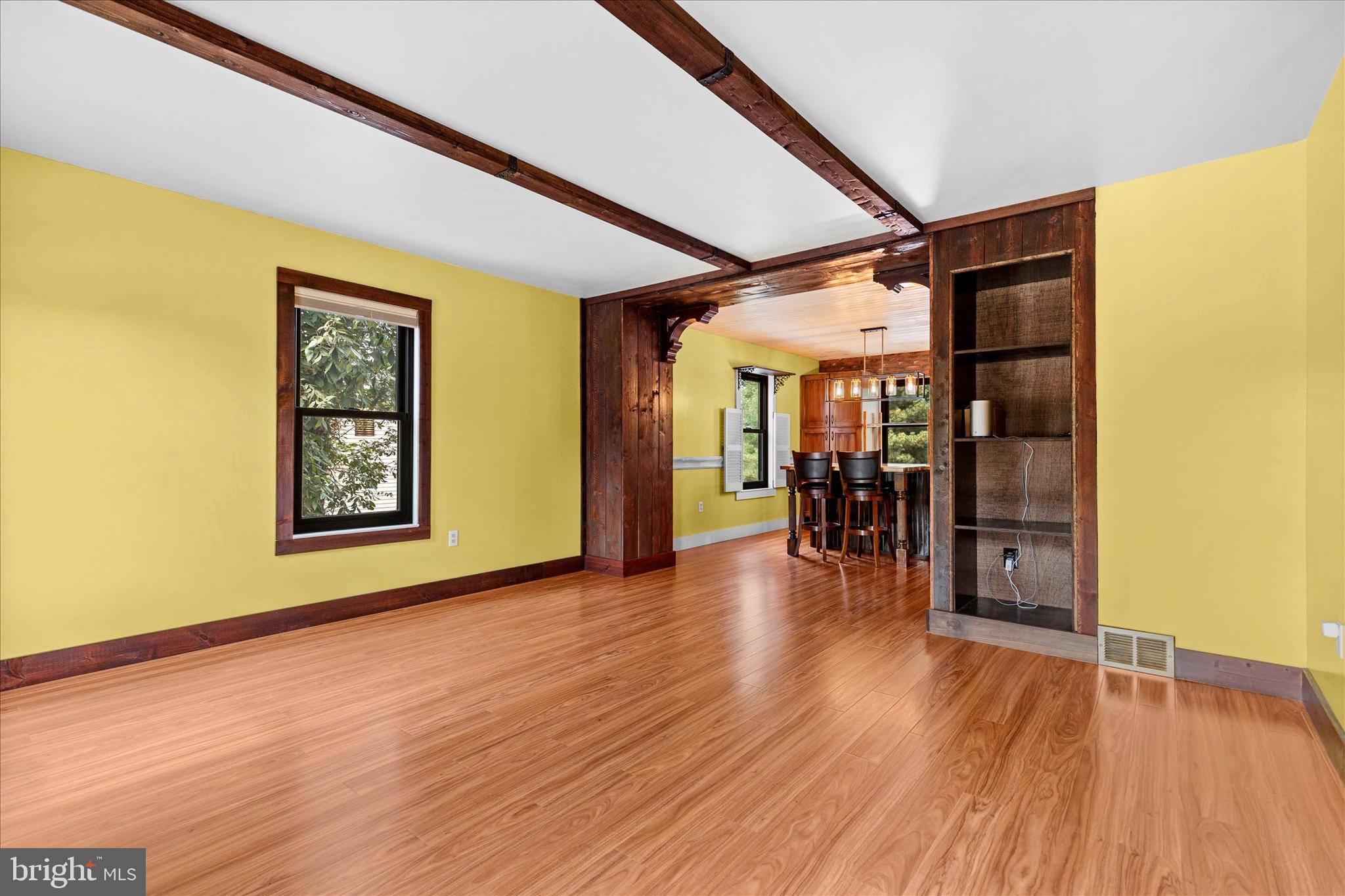 1769 Rainbow Circle York, PA 17408 - Photo 7 of 38 a view of empty room with wooden floor and fireplace