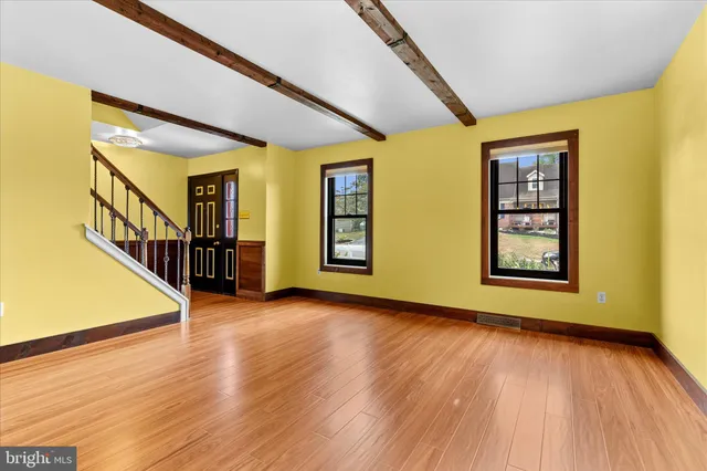a dining room with large window