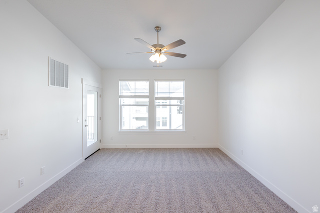 4662 Poplar Way, Unit Q303 Mapleton, UT 84664 - Photo 9 of 18 Spare room with light colored carpet and a ceiling fan