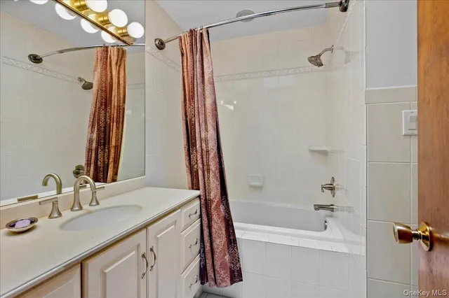 an empty room with furniture and closet