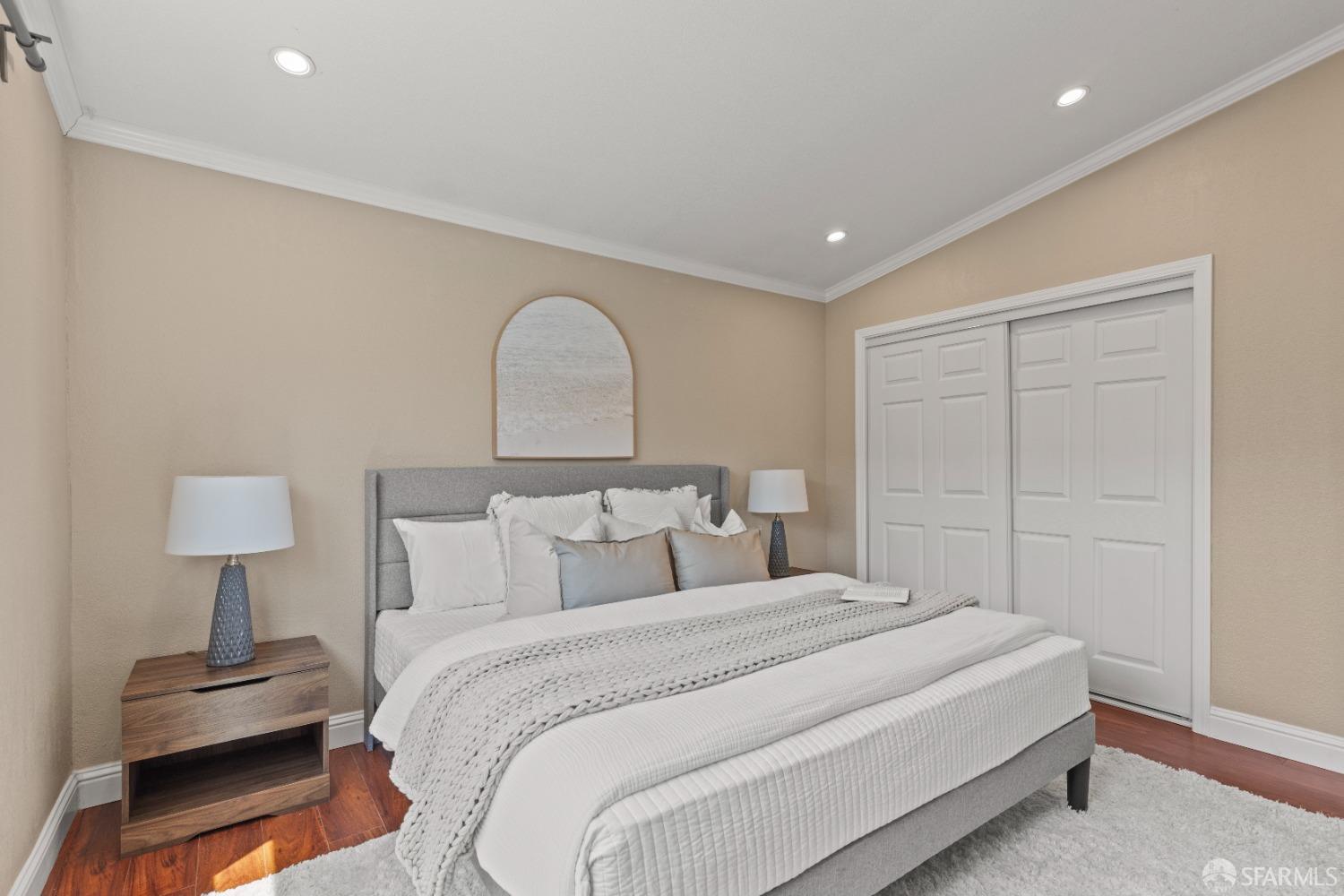 2445 Cabrillo Drive Hayward, CA 94545 - Photo 18 of 49 a bedroom with a bed and a lamp