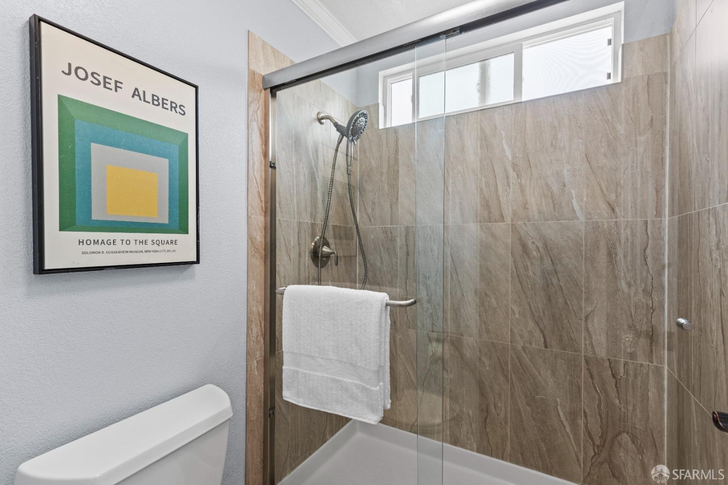 2445 Cabrillo Drive Hayward, CA 94545 - Photo 22 of 49 a bathroom with a shower curtain and a sink