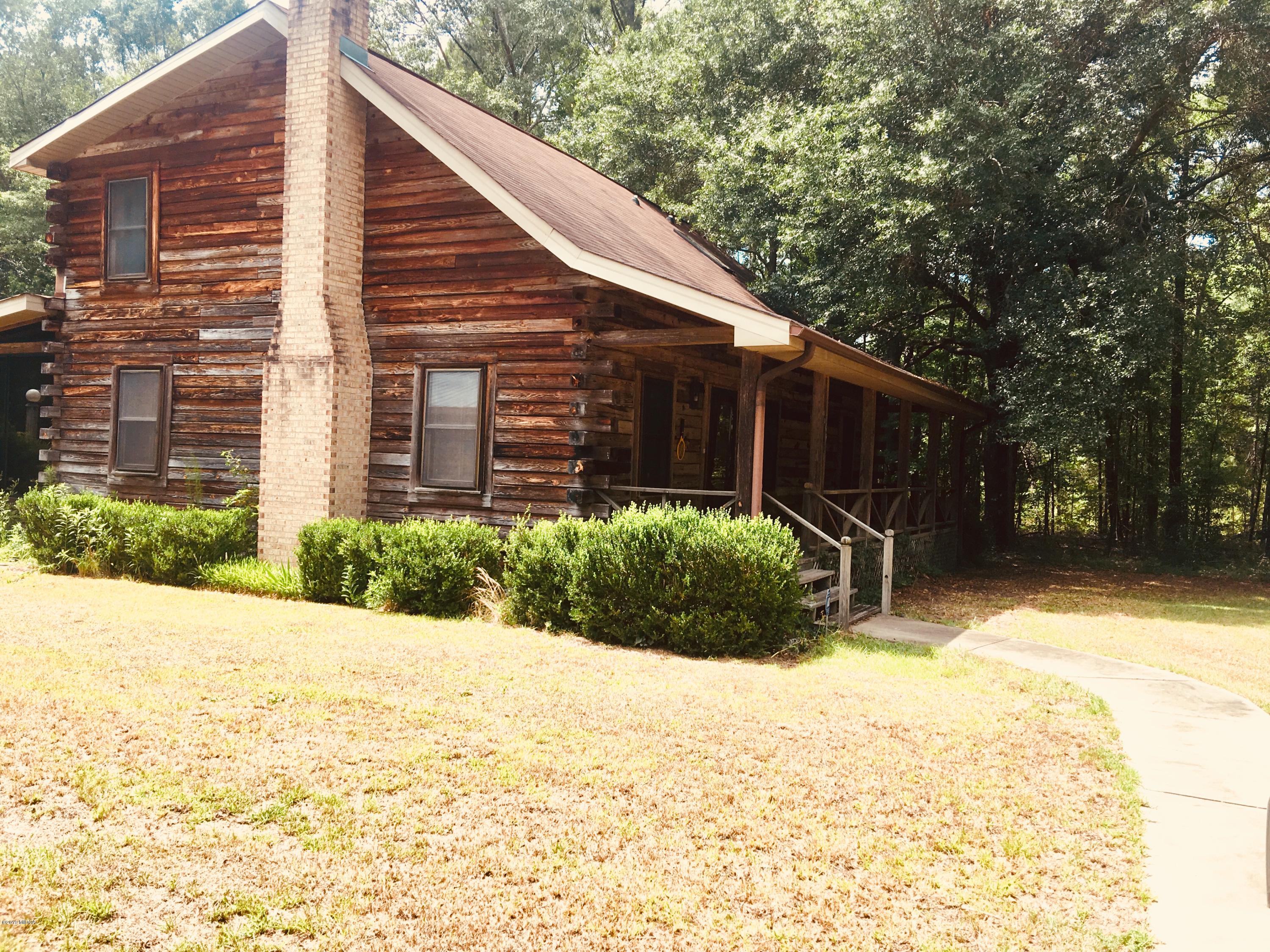 4155 Fulton Mill Road Macon, GA 31216 - Photo 1 of 20 a view of backyard of house and yard