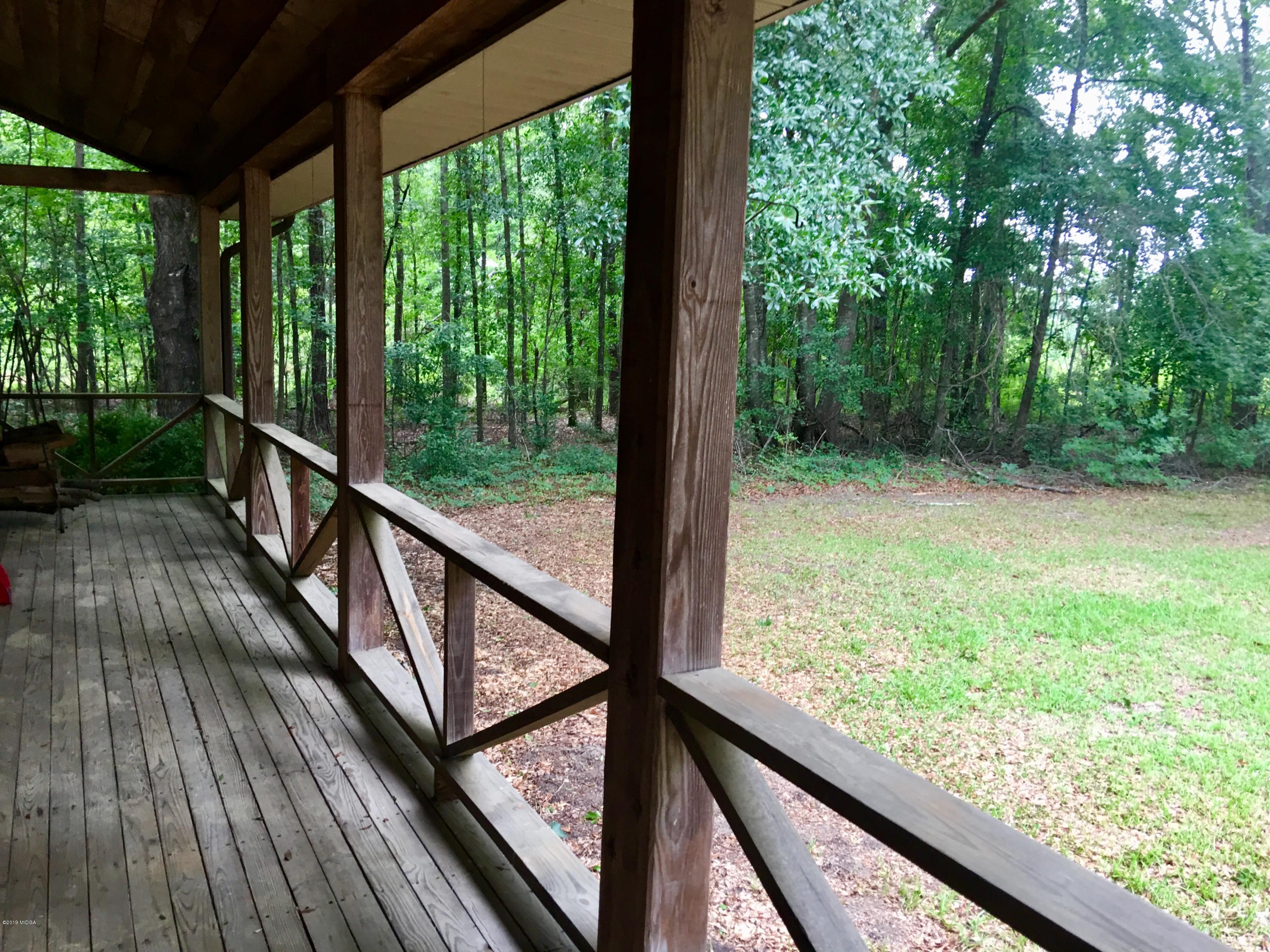 4155 Fulton Mill Road Macon, GA 31216 - Photo 2 of 20 a view of balcony with wooden floor