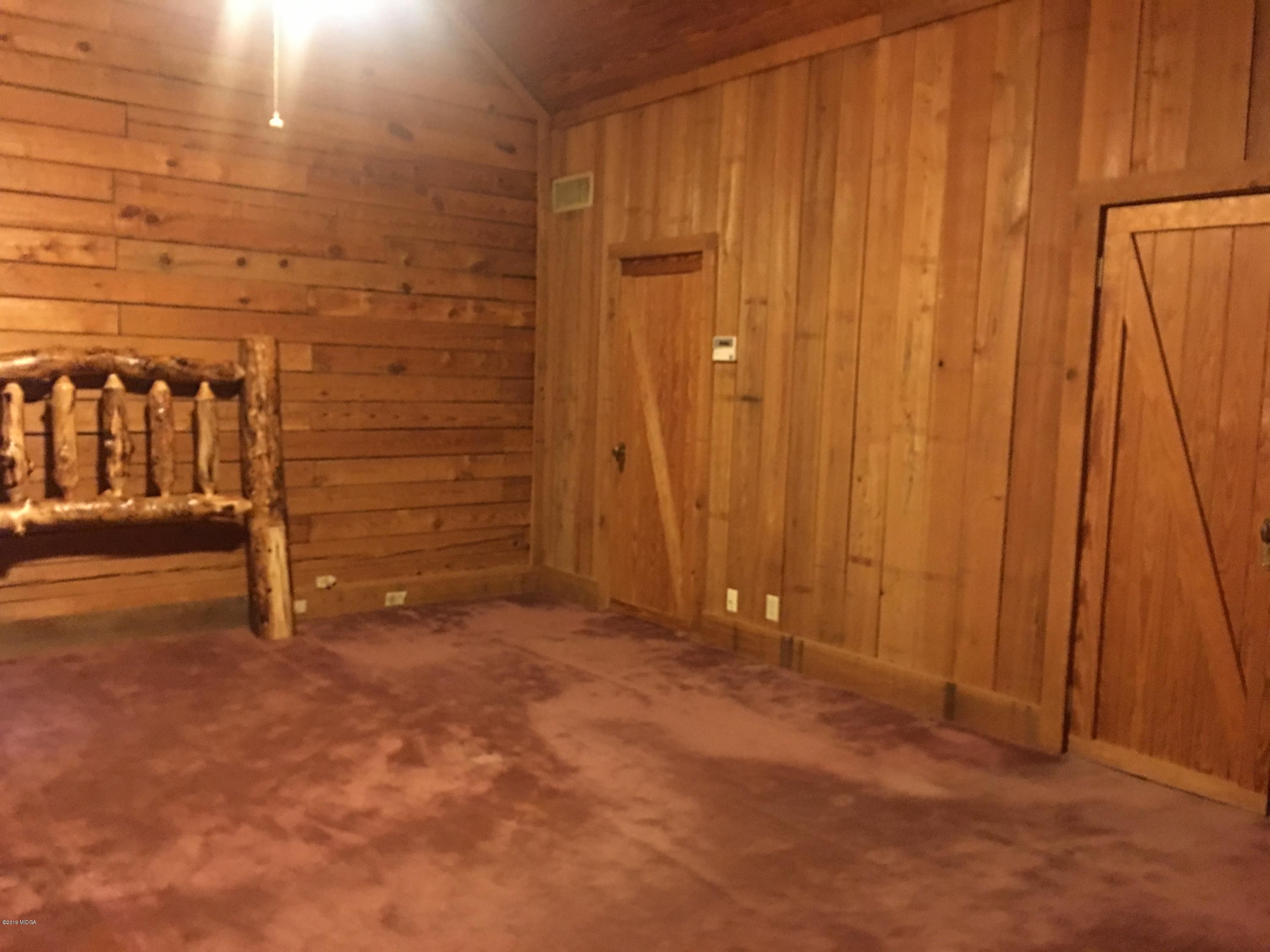 4155 Fulton Mill Road Macon, GA 31216 - Photo 13 of 20 a view of an empty room with a wooden walls