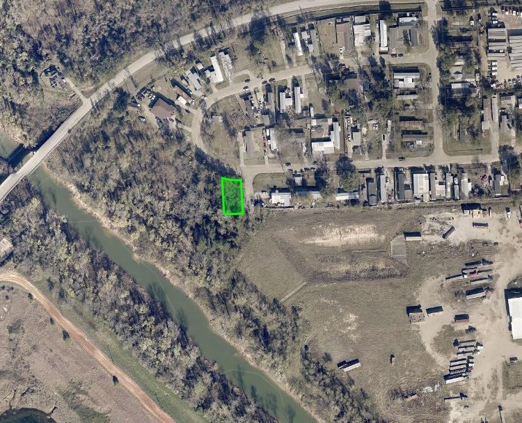 0 Spicewood Lane Houston, TX 77044 - Photo 1 of 7 a view of a city with tall trees