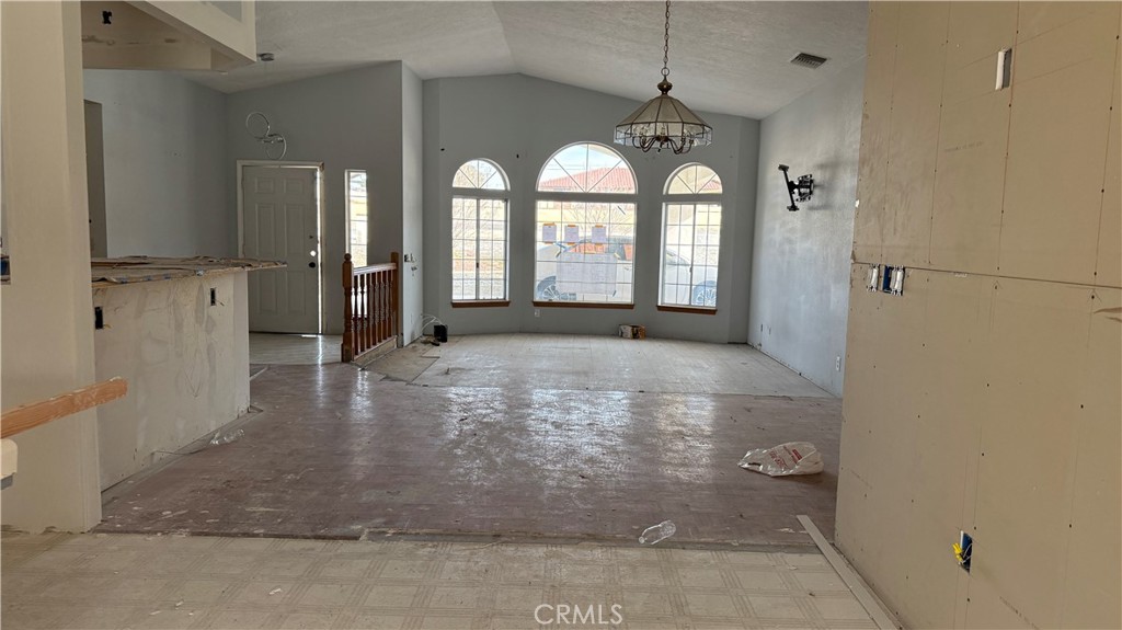 13116 Rincon Road Apple Valley, CA 92308 - Photo 4 of 62 a view of a room with large windows