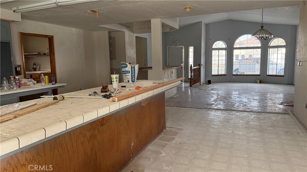13116 Rincon Road Apple Valley, CA 92308 - Photo 5 of 62 a large living room with a large window