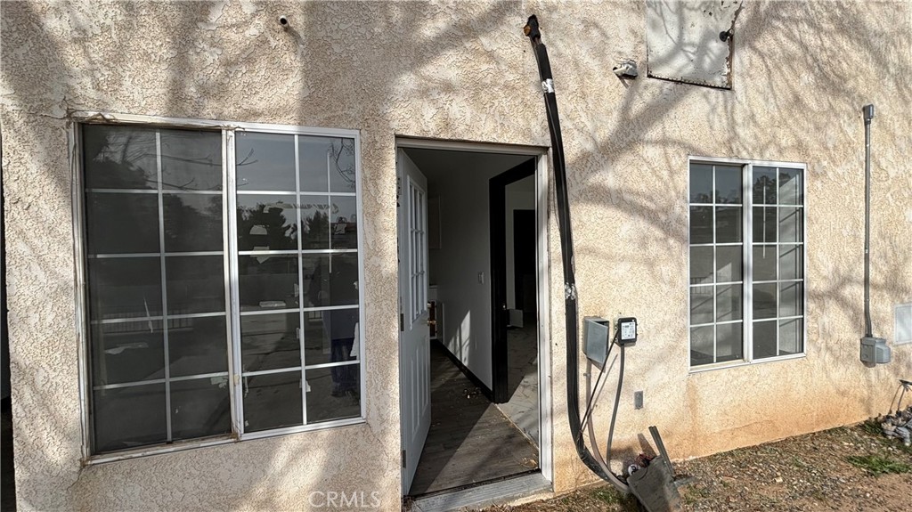 13116 Rincon Road Apple Valley, CA 92308 - Photo 56 of 62 a view of a house with a large window