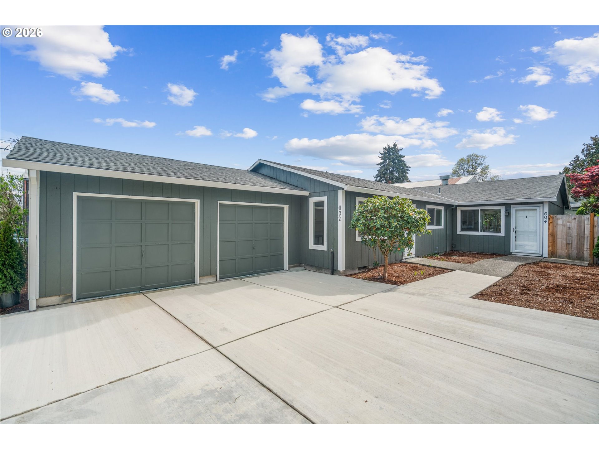 a porch with seating space and a potted plant