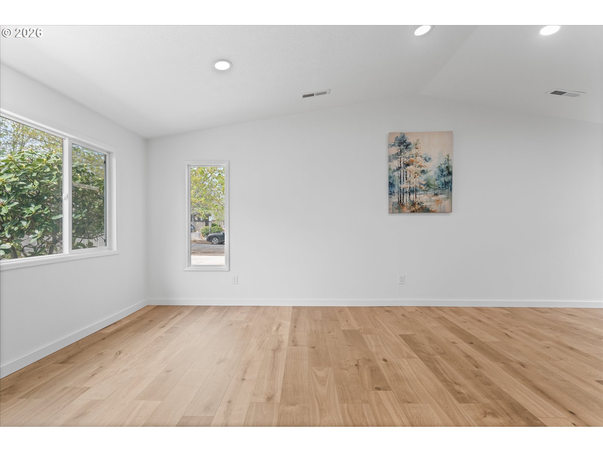 602 South Vermont Street Portland, OR 97219 - Photo 22 of 46 wooden floor in an empty room with a window