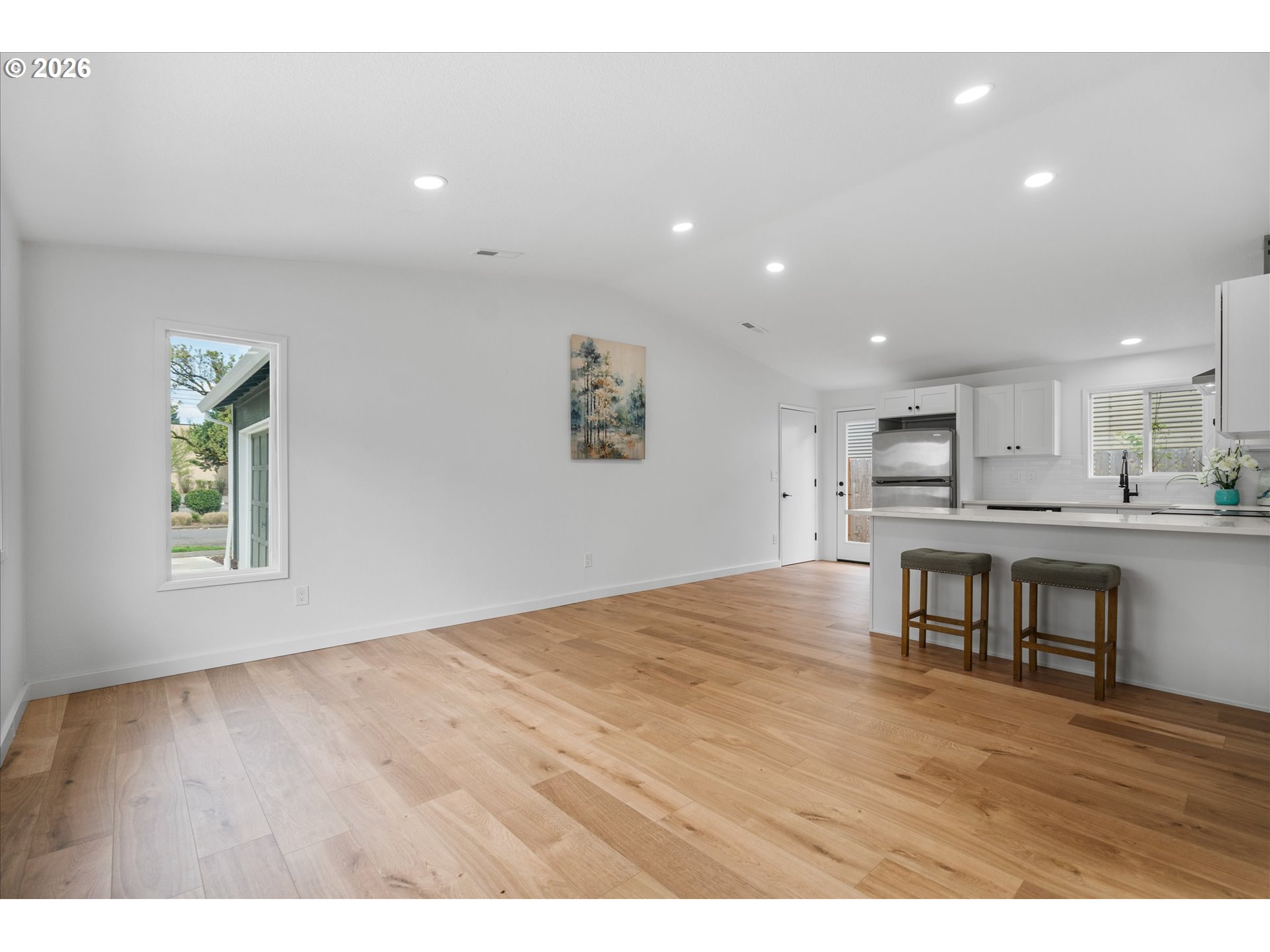 602 South Vermont Street Portland, OR 97219 - Photo 23 of 46 a view of kitchen with furniture and wooden floor