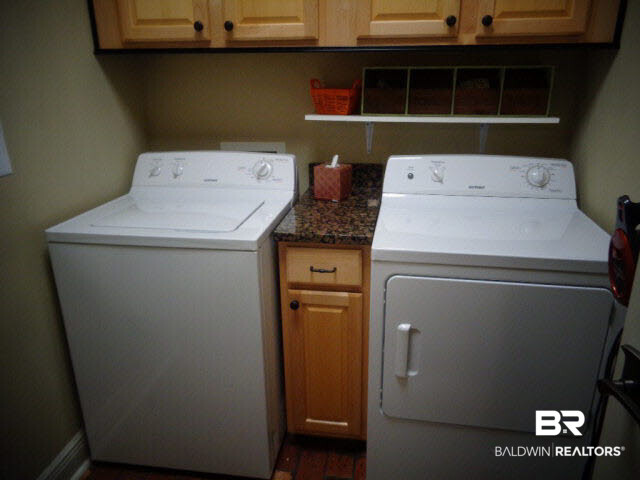 6674 Cook Road Foley, AL 36535 - Photo 17 of 45 7 x 5. Hotpoint washer and dryer convey. Built in wood cabinets.