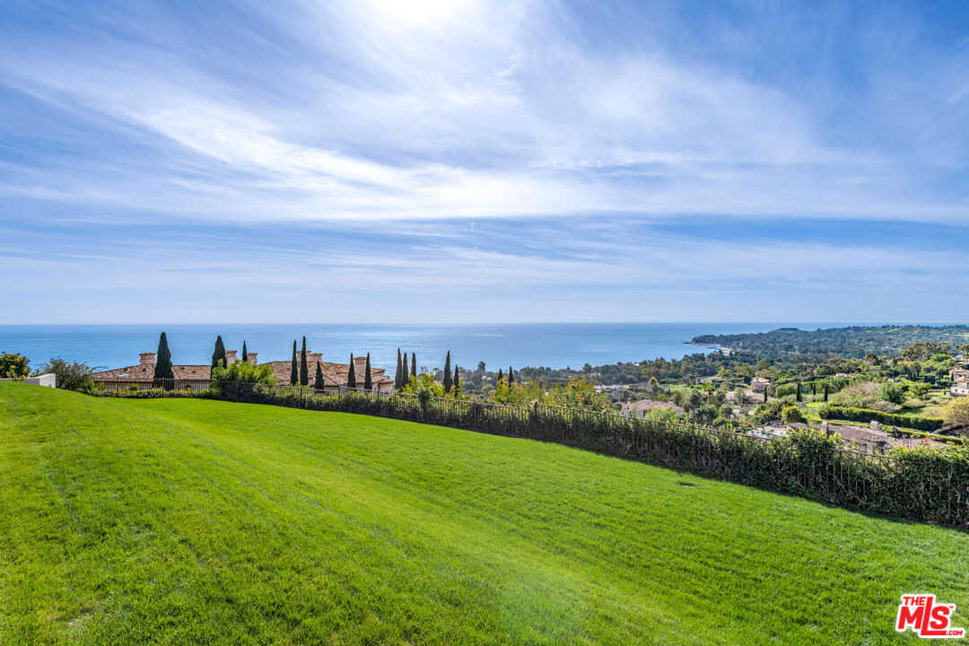 27445 Winding Way Malibu, CA 90265 - Photo 16 of 59 a view of a big yard with a city view