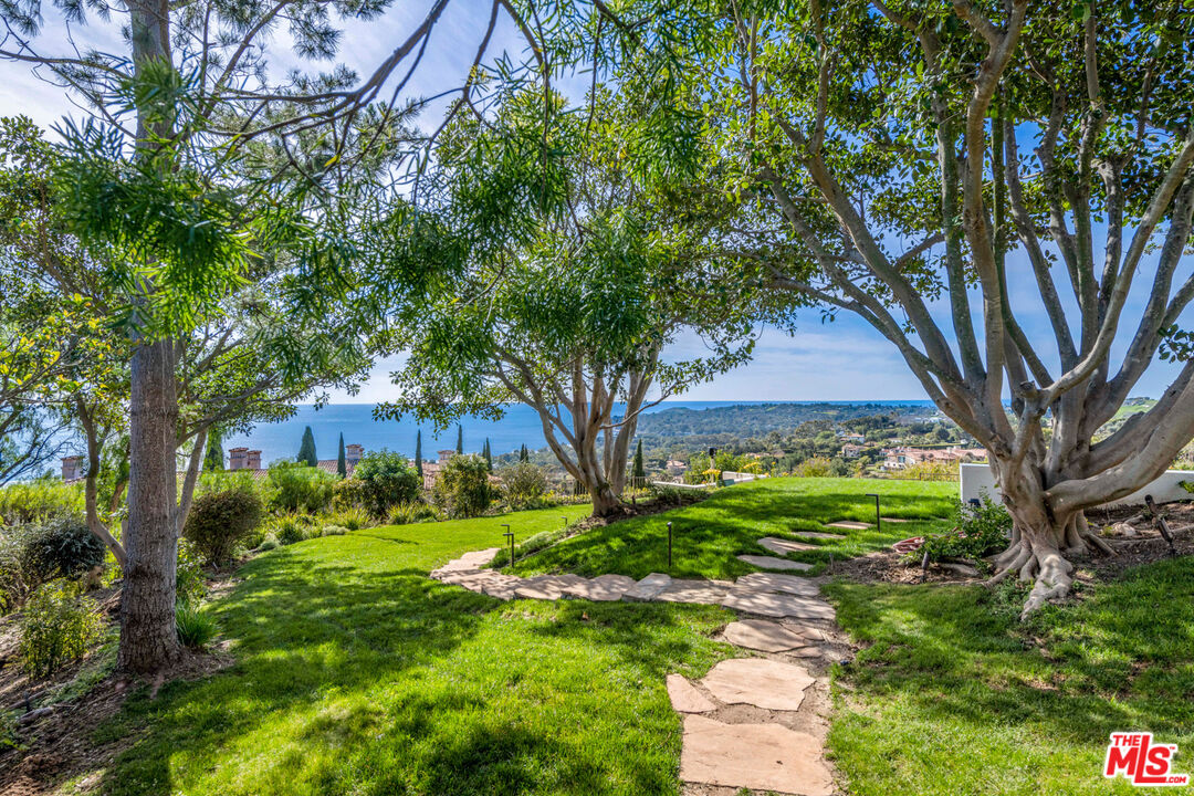 27445 Winding Way Malibu, CA 90265 - Photo 21 of 59 a view of a tree in front of a house