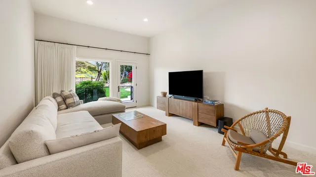 a view of an chairs in front of house