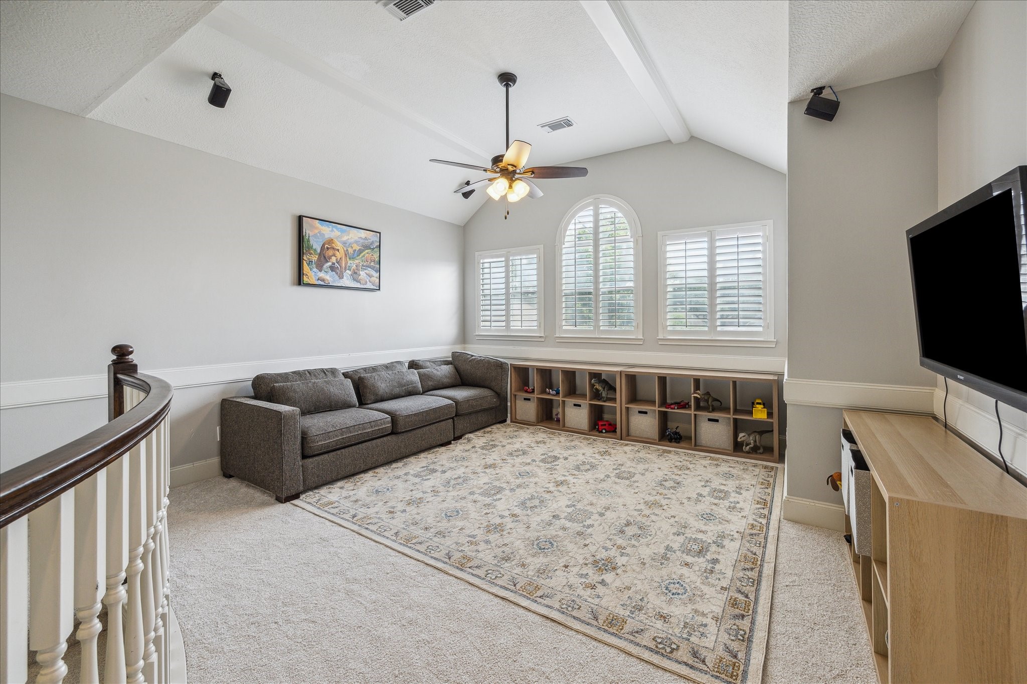 13627 Ashley Run Houston, TX 77077 - Photo 19 of 30 a living room with furniture and a flat screen tv