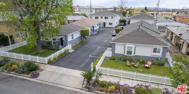 a view of a house with a garden