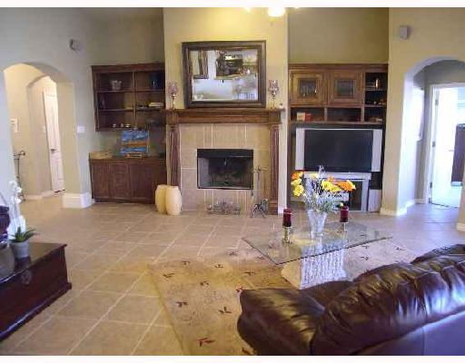6542 Lens Drive Corpus Christi, TX 78414 - Photo 2 of 8 a living room with furniture and a fireplace