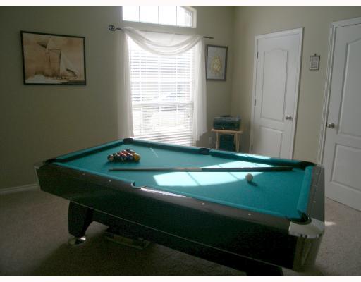 6542 Lens Drive Corpus Christi, TX 78414 - Photo 8 of 8 a room with a bed and a window