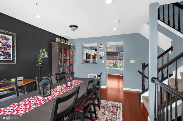 a view of a chairs and table in the balcony