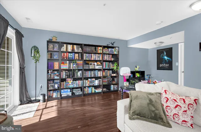 a view of a workspace with furniture and toys