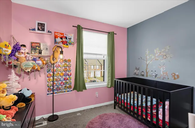 a room with furniture and book shelf