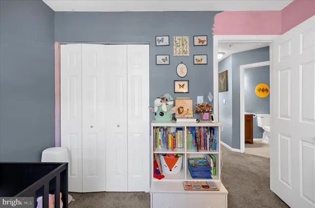 a workspace with furniture and a potted plant