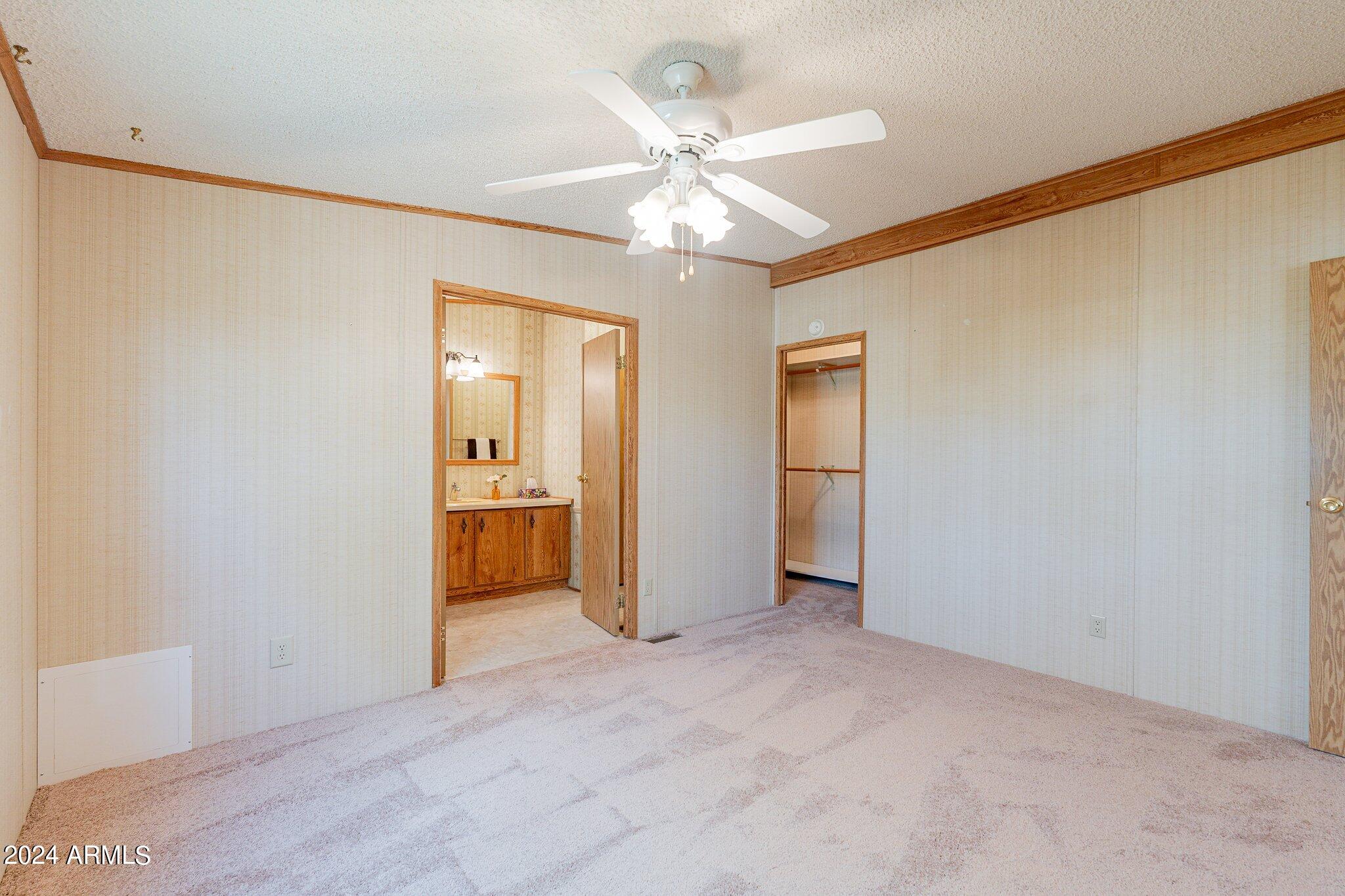 8945 North Page Road Florence, AZ 85132 - Photo 17 of 37 Primary Suite
