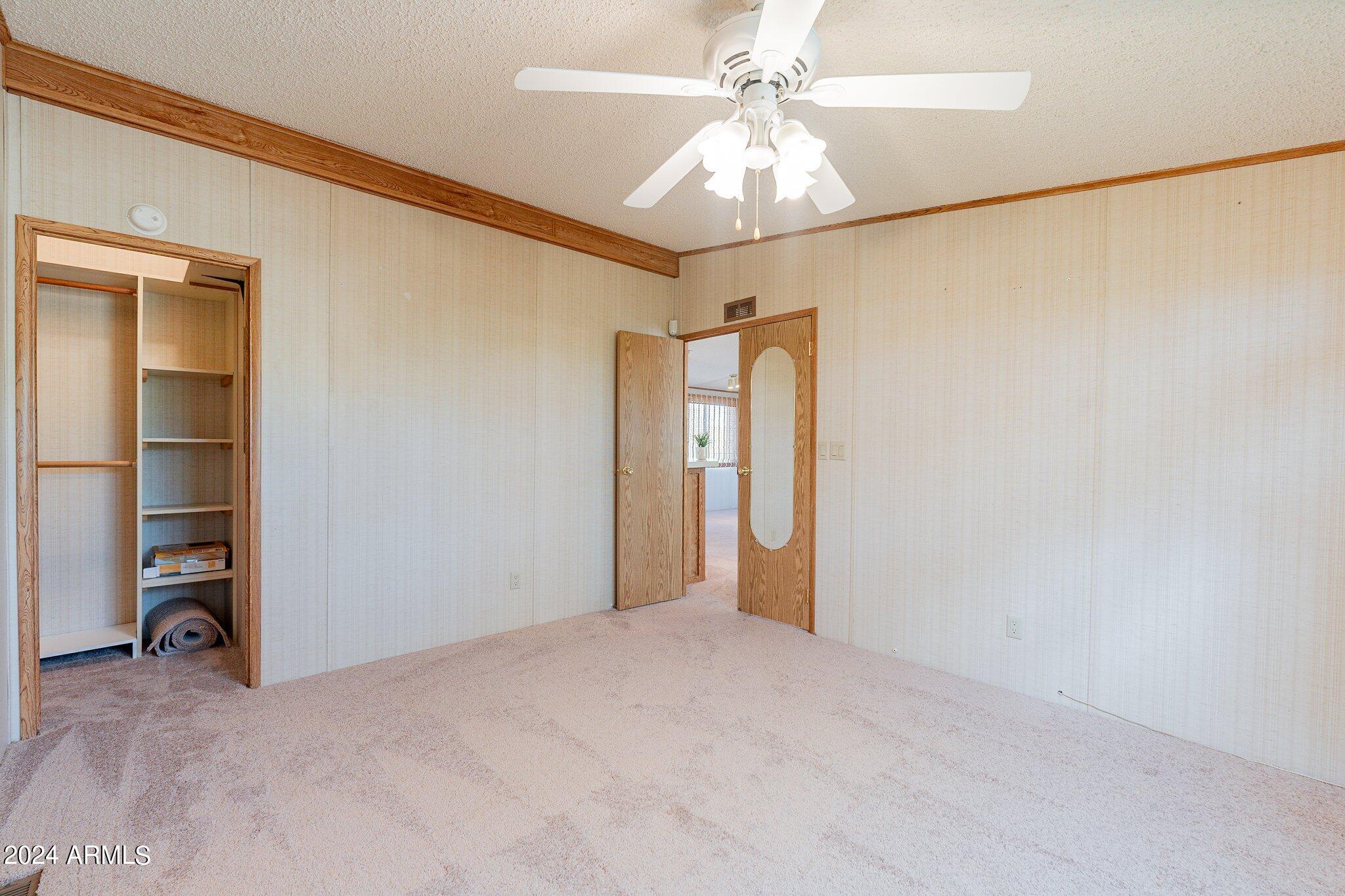 8945 North Page Road Florence, AZ 85132 - Photo 18 of 37 Primary Suite