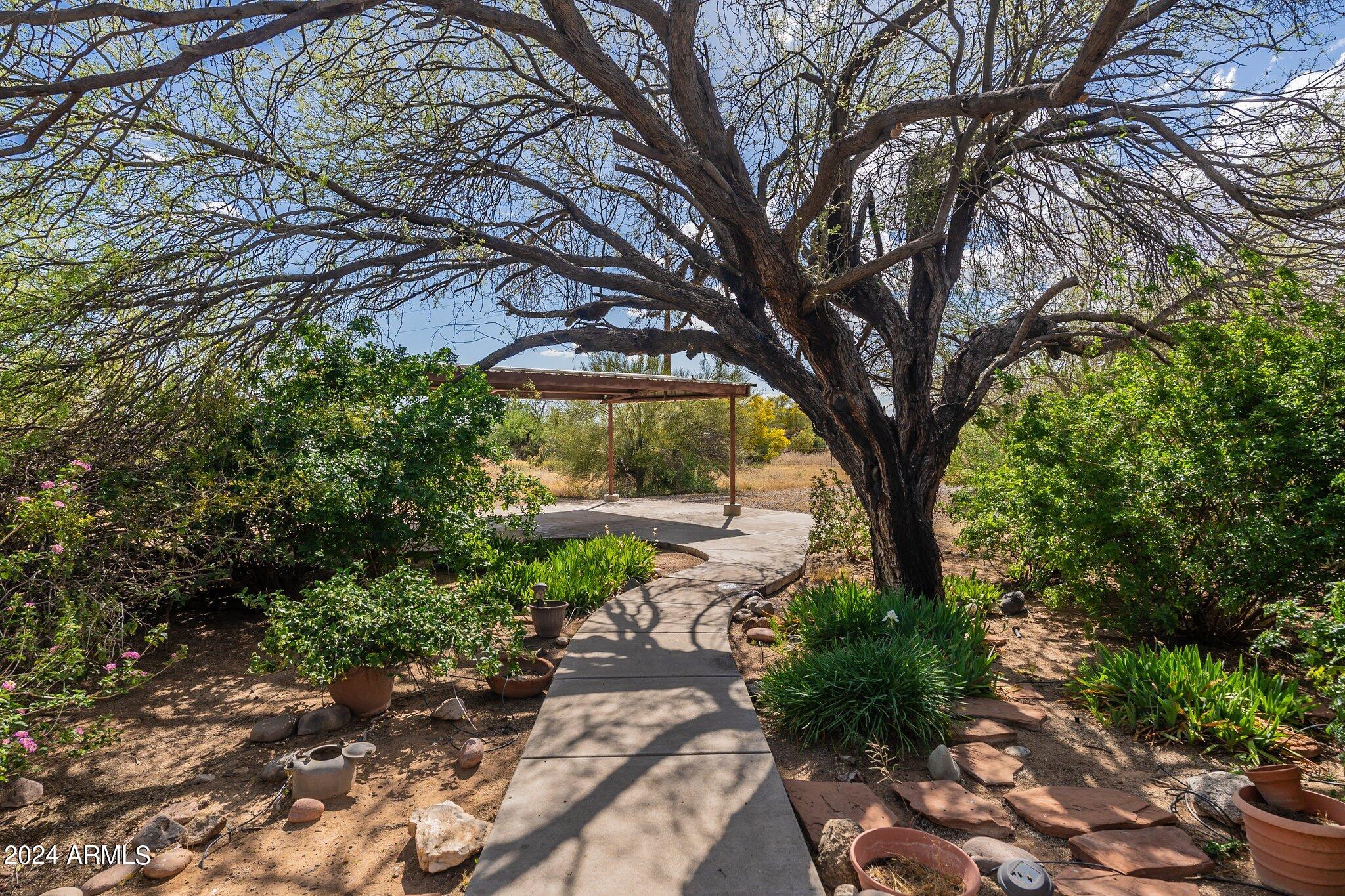 8945 North Page Road Florence, AZ 85132 - Photo 32 of 37 Sidewalk to carport