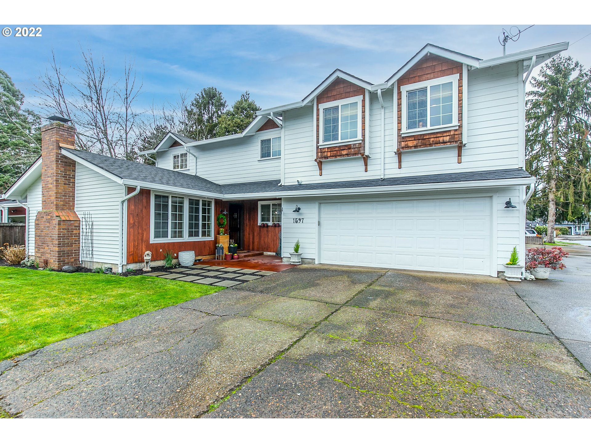 1597 Balboa Street Eugene, OR 97408 - Photo 1 of 27 a view of a yard in front of house