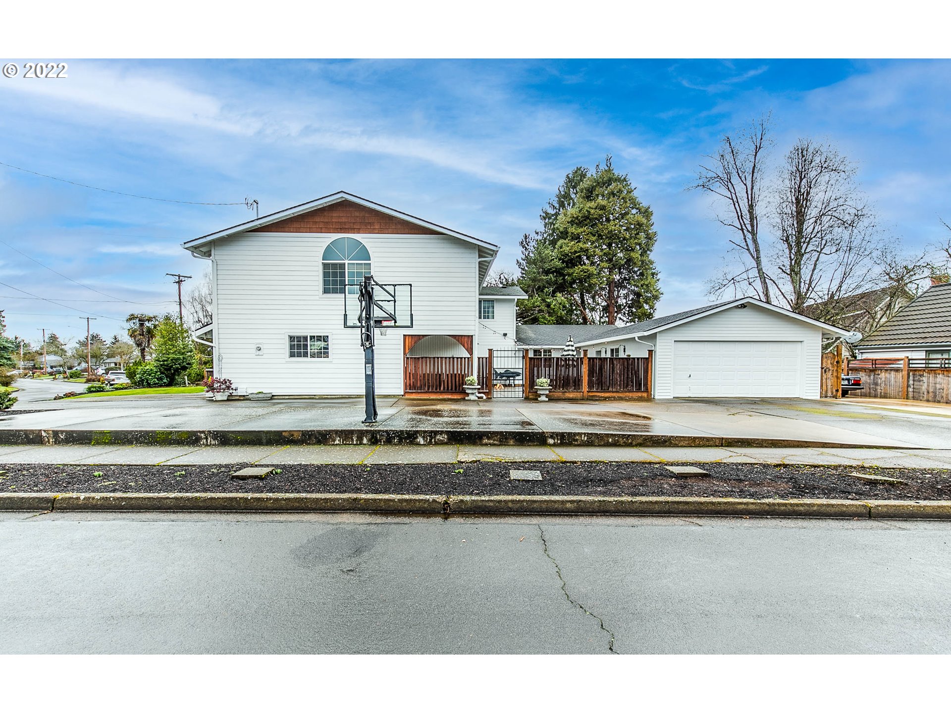 1597 Balboa Street Eugene, OR 97408 - Photo 23 of 27 a view of a house with a yard