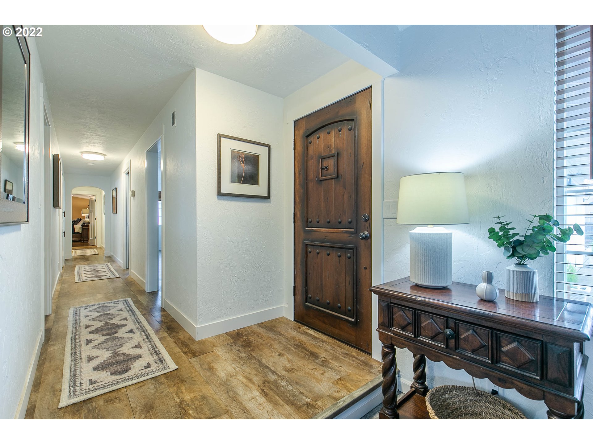 1597 Balboa Street Eugene, OR 97408 - Photo 3 of 27 a workspace room with furniture and wooden floor
