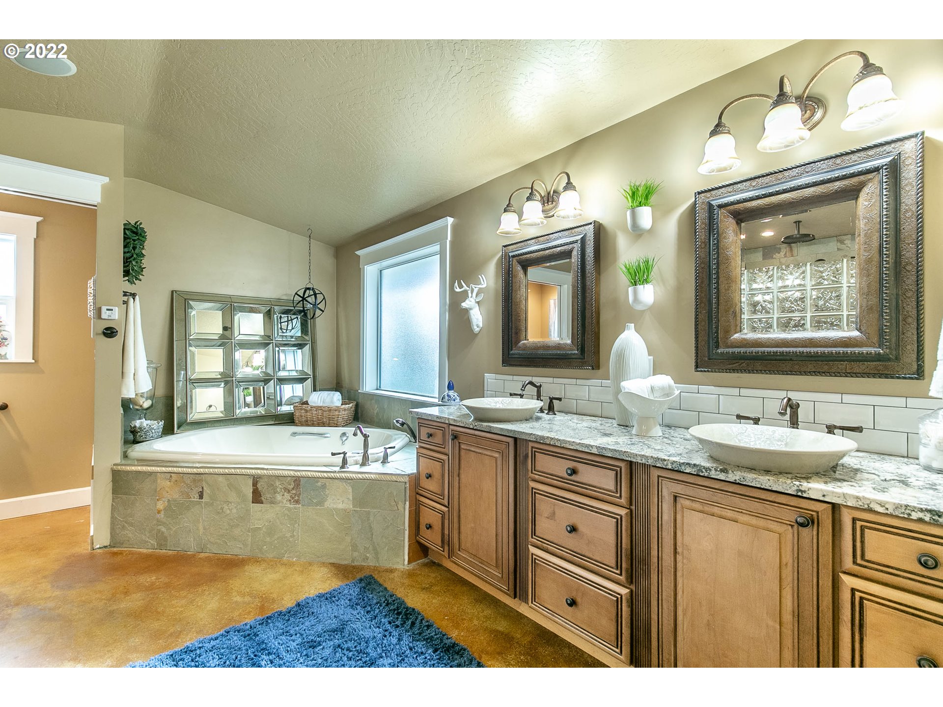 1597 Balboa Street Eugene, OR 97408 - Photo 9 of 27 a bathroom with a granite countertop sink mirror and bathtub
