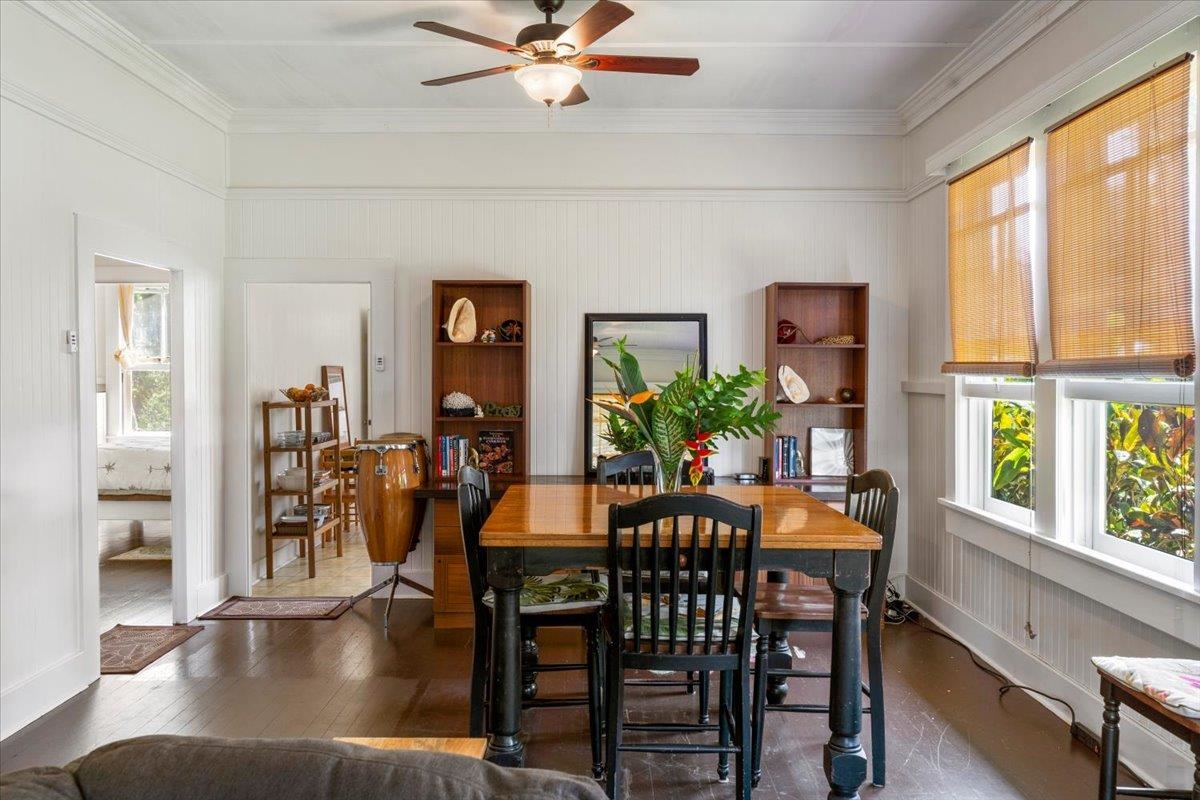 745 Kauhikoa Road Haiku, HI 96708 - Photo 4 of 8 a view of a dining room with furniture window and wooden floor