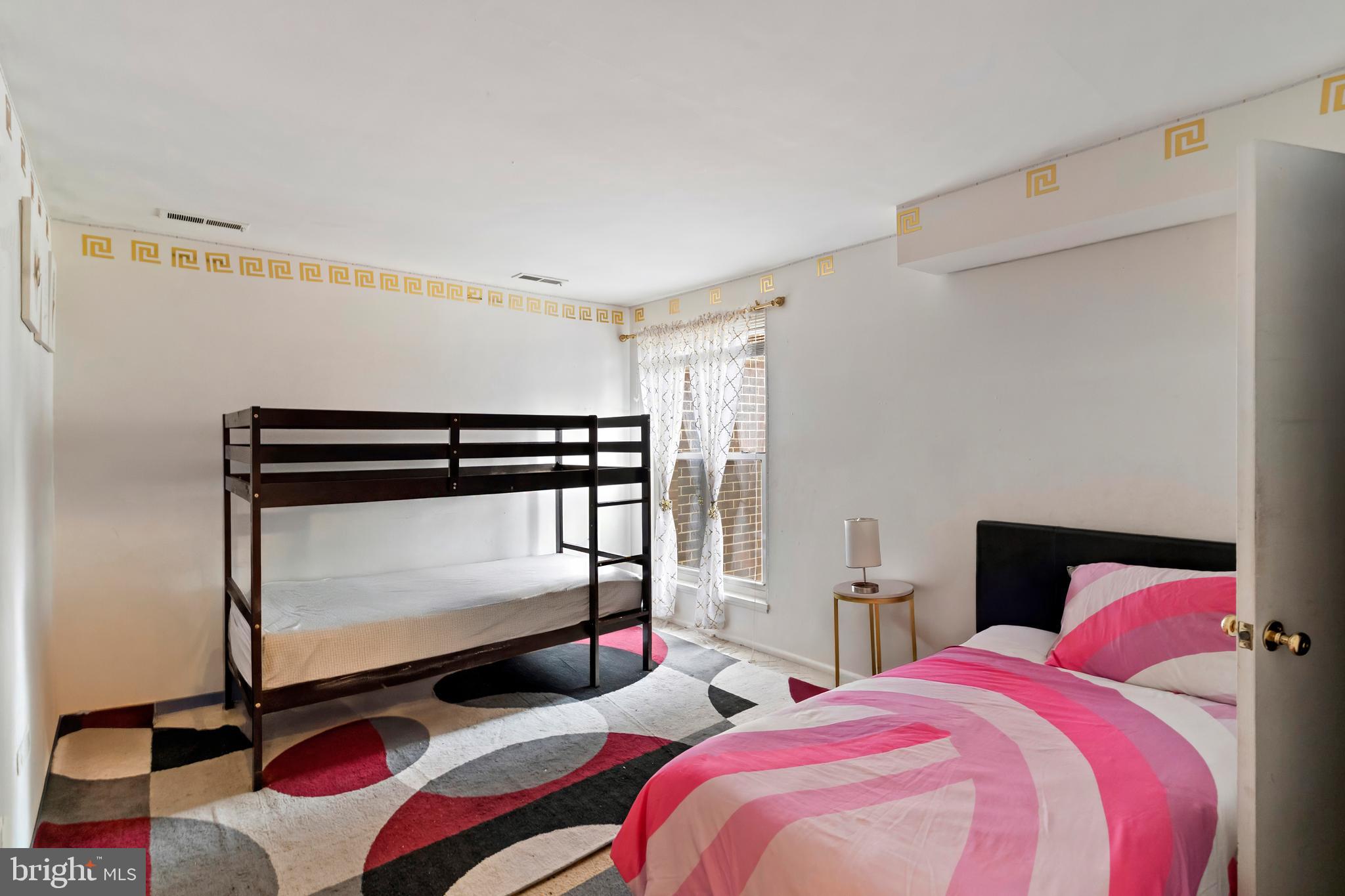 3362 Woodburn Road, Unit 13 Annandale, VA 22003 - Photo 13 of 19 a bedroom with two bed and a window