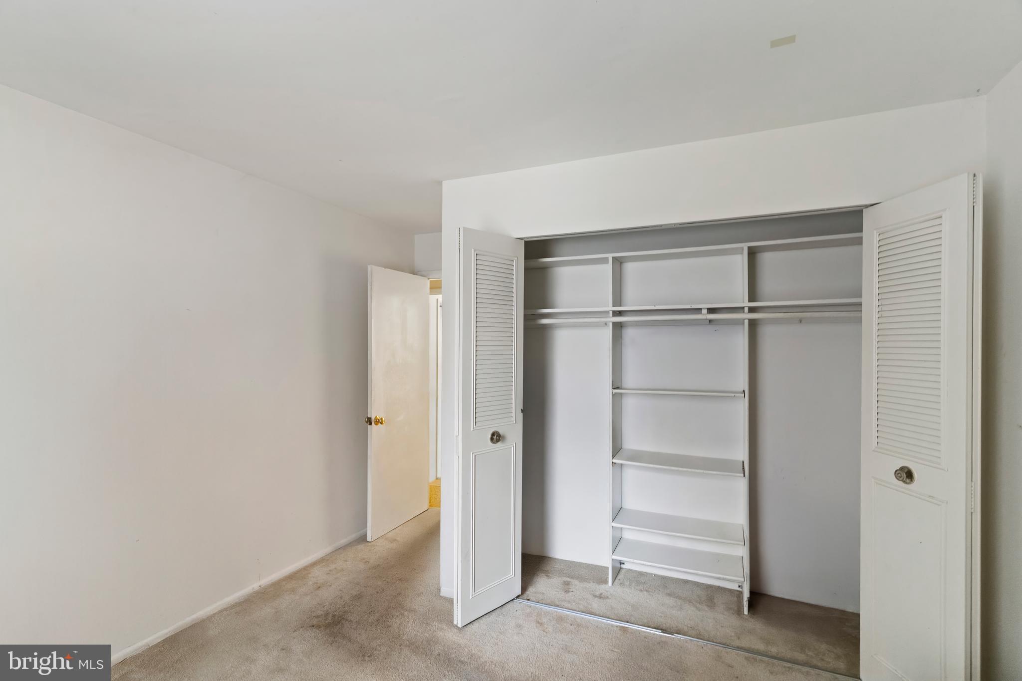 3362 Woodburn Road, Unit 13 Annandale, VA 22003 - Photo 15 of 19 a view of an empty walk in closet