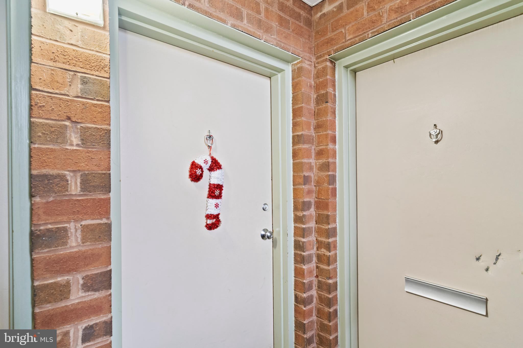 3362 Woodburn Road, Unit 13 Annandale, VA 22003 - Photo 2 of 19 a white house with glass door