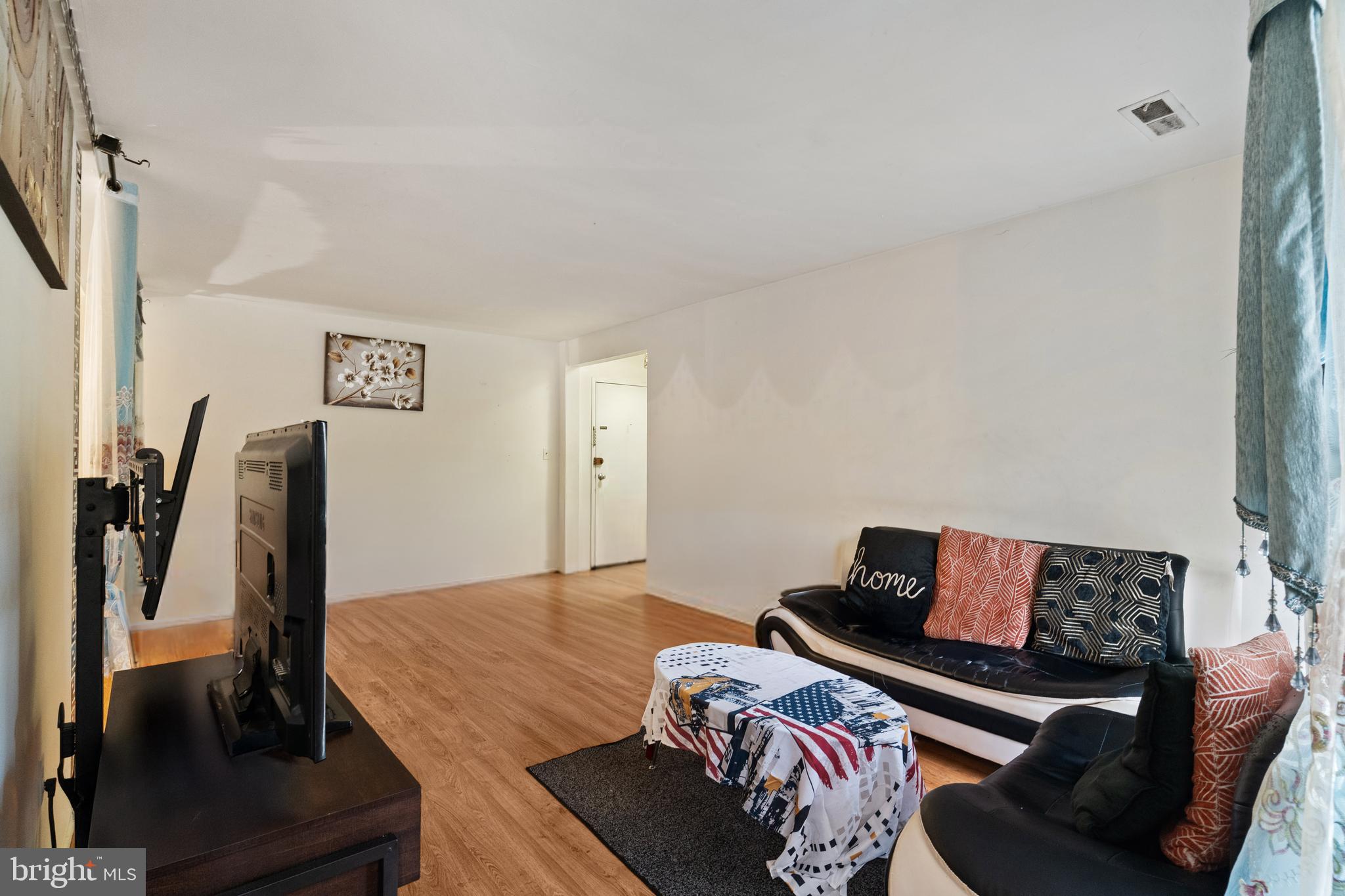 3362 Woodburn Road, Unit 13 Annandale, VA 22003 - Photo 3 of 19 a living room with furniture and a couch