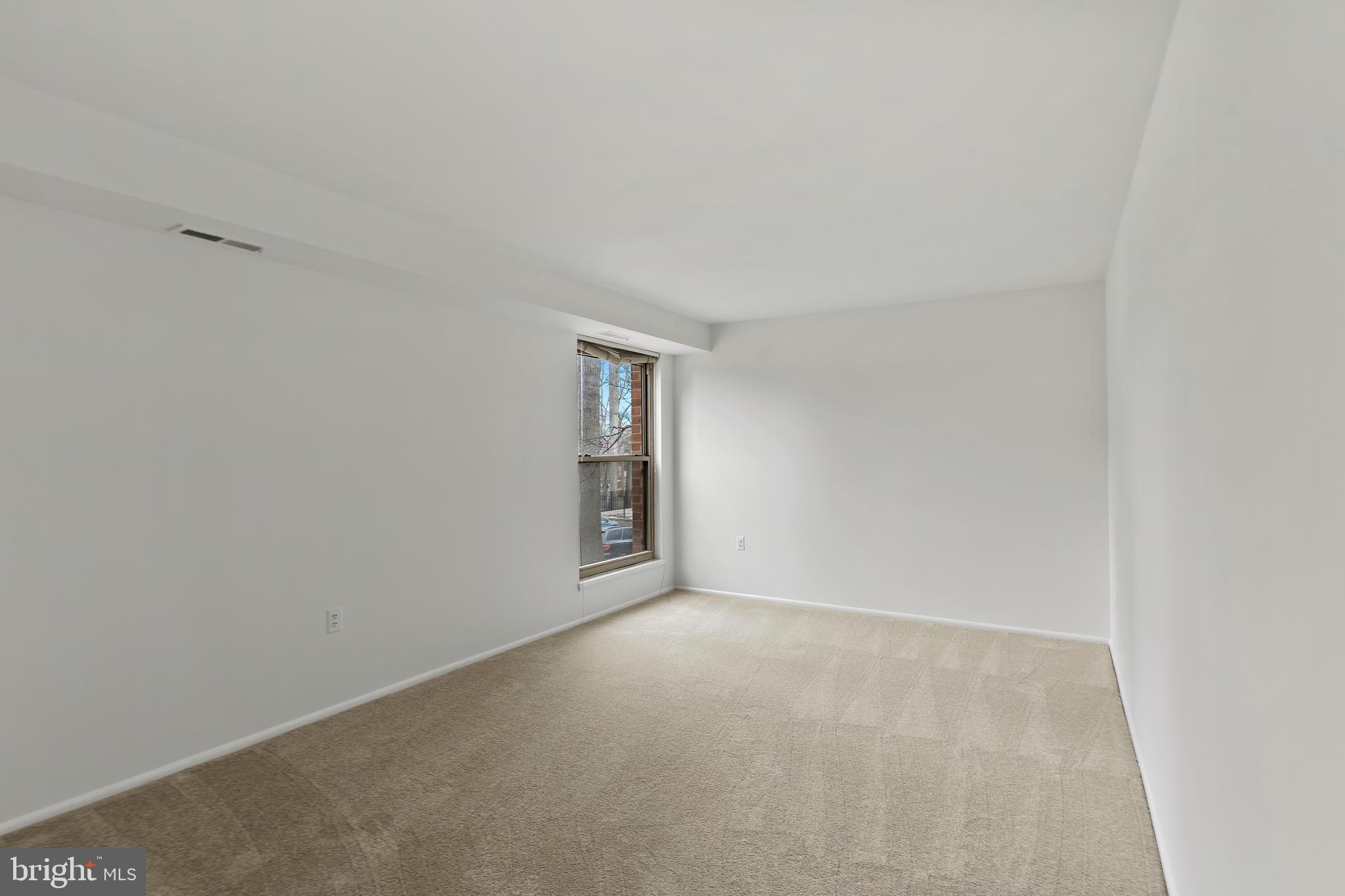3362 Woodburn Road, Unit 13 Annandale, VA 22003 - Photo 8 of 17 a view of an empty room with a window