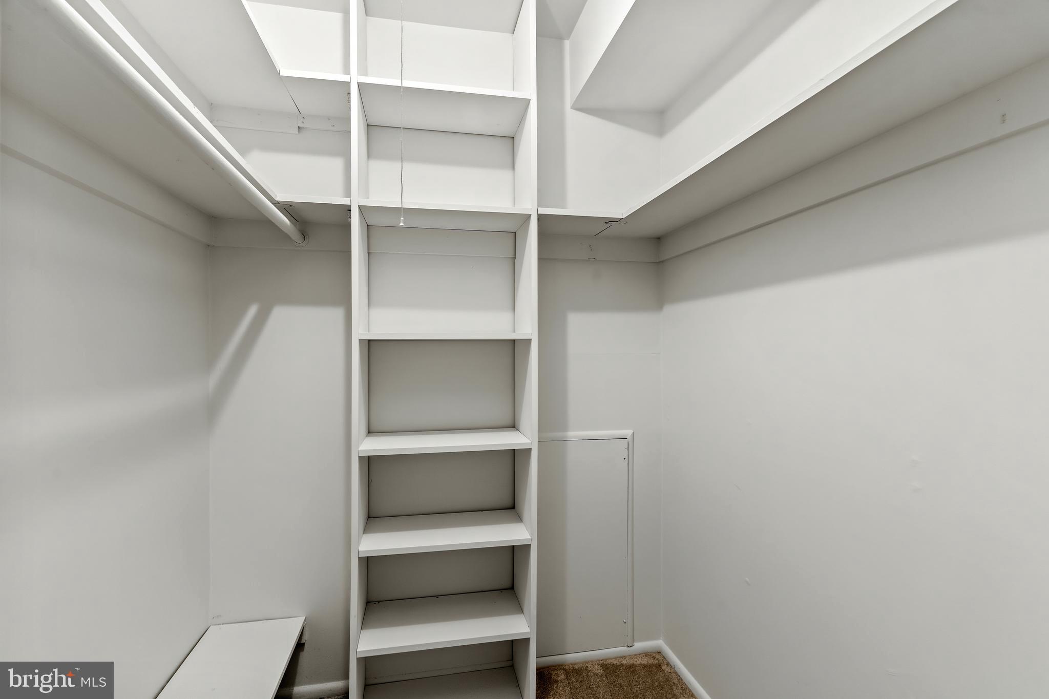 3362 Woodburn Road, Unit 13 Annandale, VA 22003 - Photo 10 of 17 a view of walk in closet with empty racks